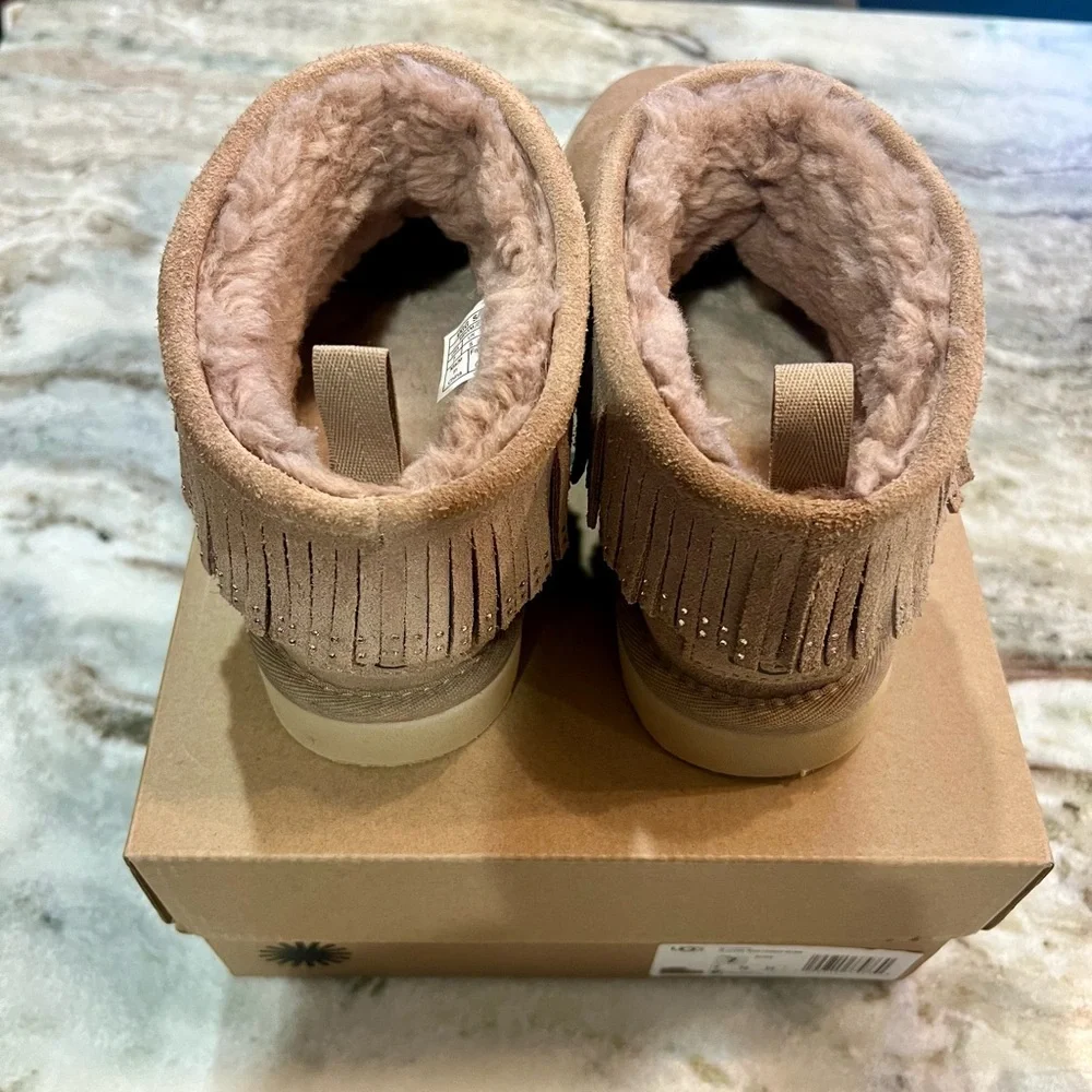 UGG Classic Ultra Mini with decorative trim around the top. - Picture 8 of 14